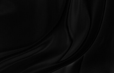 Black gray satin dark fabric texture luxurious shiny that is abstract silk cloth background with patterns soft waves blur beautiful.