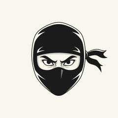 Close-up graphic illustration of a ninja head, stern expression, black mask.