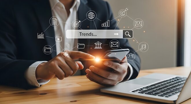 Analyzing business trends online with smartphone and laptop for market research strategy data