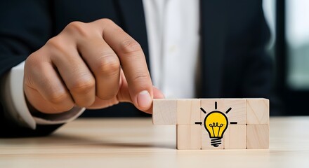 Business creative idea concept with wooden blocks and light bulb icon for problem solving