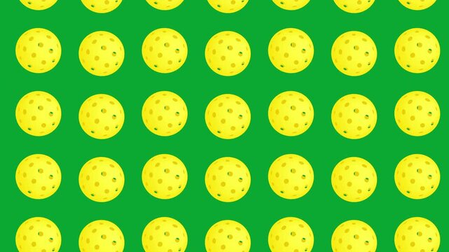 pickleball balls animated pattern   on green background repeat video footage
