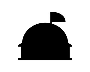 Black silhouette of a building with a dome and flag on top