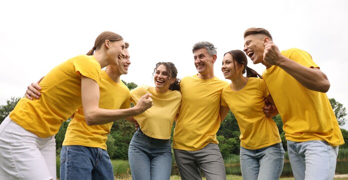 Team building. Group of happy people together outdoors