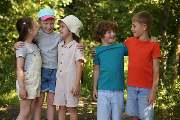 Fototapeta premium Happy children spending time together in nature