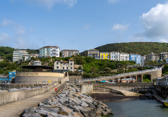 Colorful large houses, hotels or guest houses on the hillside at Ventnor on the Isle of Wight with roadway to beachfront