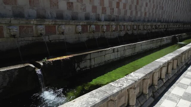 Italy, July 10, 2025: Aerial view of the Fountain of the 99 Spouts (also known as the Rivera Fountain), a monumental fountain in L'Aquila, included in the list of Italian national monuments