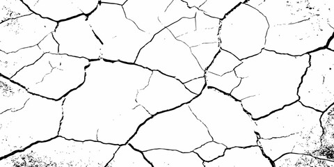 Cracked dry earth texture in high-contrast black and white, showing fragmented surface patterns. Ideal for drought, decay, or distressed background concepts in design and illustration.