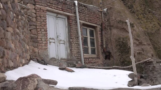 Iranian living village of Masuleh,: picturesque houses in the rocks, rock shelters. 14th century,