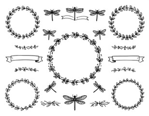 Obraz premium Hand-drawn floral and dragonfly design elements