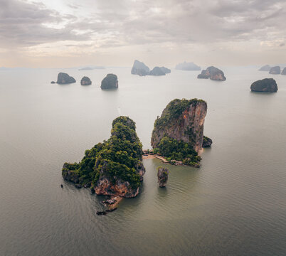 Aerial view of James Bond Island, a dramatic limestone karst rising sharply from the emerald waters, a jewel of Phang Nga Bay, Phang Nga Bay, Thailand.