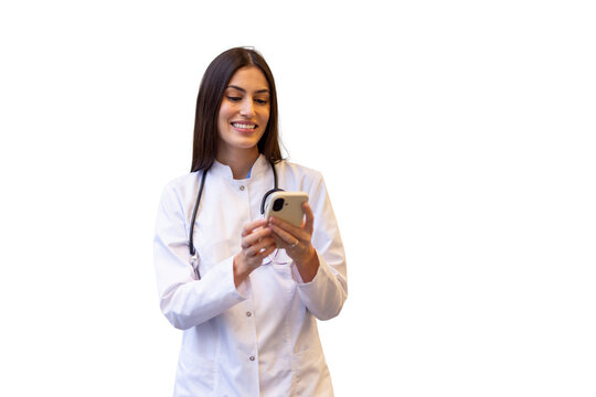 Female doctor wearing lab coat and stethoscope using smartphone, smiling, on transparent background
