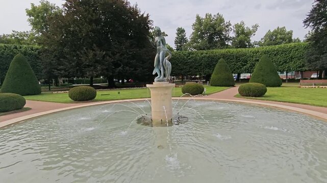 Podebrady, Czech Republic - 2025-07-25.  Lady and the swan statue in the Podebrady town park