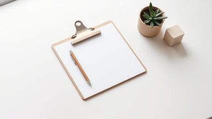 Bright minimalist desk with clipboard and pen
