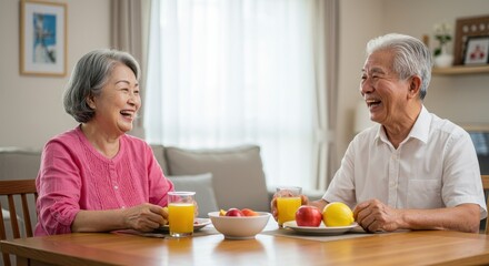 Joyful Senior Couple Sharing Laughter and Healthy Breakfast at Home
