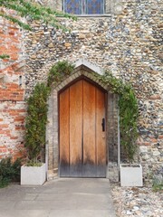 Naklejka premium church, old wooden door, door, clare, priory, village, entrance, suffolk, uk