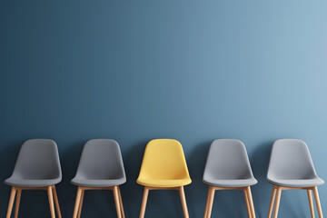 Obraz premium A Single Yellow Chair Among Gray Chairs Against a Teal Wall. AI Generated 