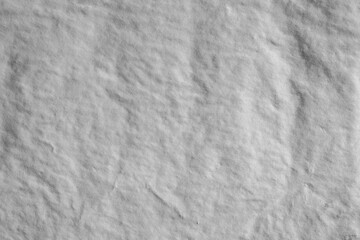 Dark grey crumpled creases paper texture