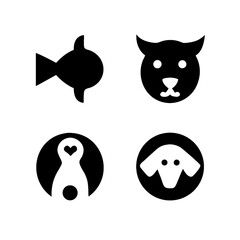 Fototapeta premium A collection of diverse animal vector illustrations, featuring black silhouettes of pets like cats and dogs, alongside other mammals, birds, and fish, perfect for icon sets or design