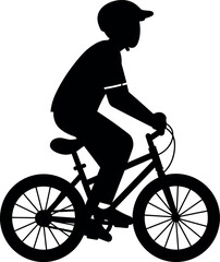Boy silhouette riding bmx bike