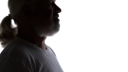 silhouette portrait of aged man on white isolated background, close up mature male face with gray beard