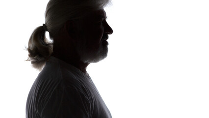 silhouette portrait of aged man on white isolated background, close up mature male face with gray beard