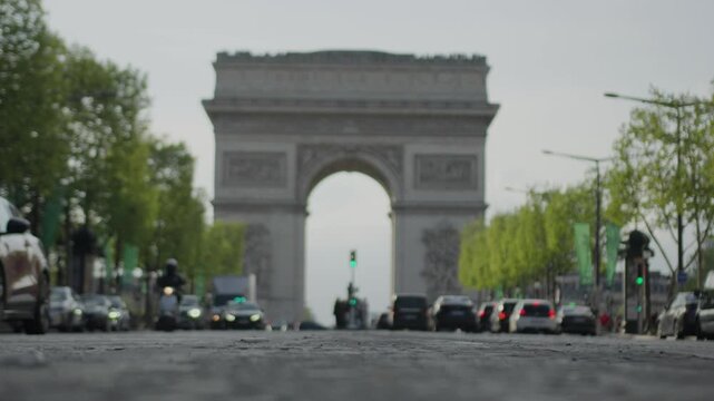 Paris, France 07.02.2025 Cars driving on avenue toward arc de triomphe in paris