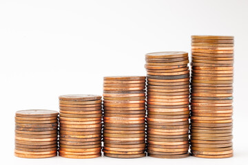 Stacks of pennies increasing in height 