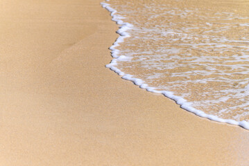 A Minimalist Seascape with White Foam on the Sand. Concept Simplicity and purity.