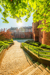 Warsaw old city center with Warsaw Barbican near Vistula river in the morning