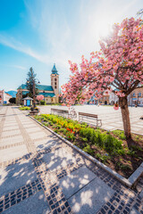 Liptovsky Mikulas main square in Liptov region around Tatras mountains , Slovakia. Church  sv. Mikulasa