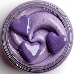 Top view of creamy lilac liquid in a transparent jar with three purple hearts inside. Elegant and romantic cosmetic product concept with soft pastel tones.