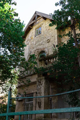 Abandoned Historic House Overgrown with Trees in Bosnia and Herzegovina