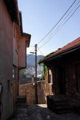 Narrow Stone Alley with Traditional Houses in Mostar