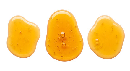 Three golden honey drops or cosmetic serum blobs with bubbles. Isolated on transparent background, png