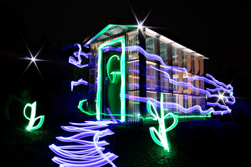 greenhouse with light trails at night