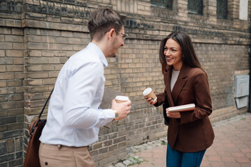 Business colleagues enjoying coffee break during workday