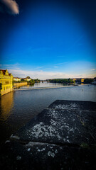 Obraz premium Golden Hour Over Vltava River