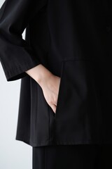 Minimalist Black Suit Detail - Hand in Pocket, Contemporary Fashion