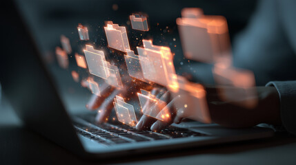 person working on laptop with holographic folder structure floating above