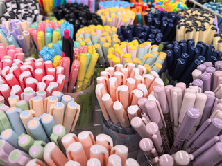 Colorful array of pens and markers in a stationery store display