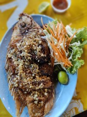 Snapper fish grilled in thai style.