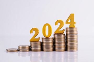 Increasing Coin Stacks with "2024" for Financial Growth Concept