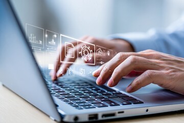 Man Using Laptop with Data Visualization Overlay