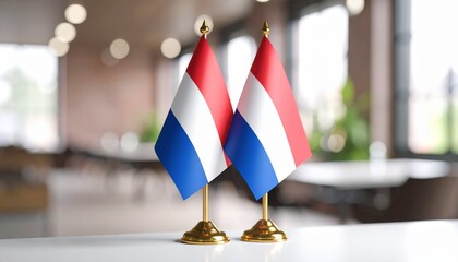 Flag of the Netherlands in the foreground with the background