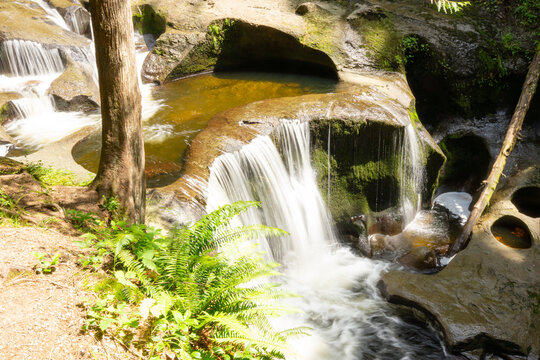 waterfall in forest canyon