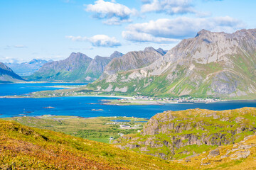 Fototapeta premium Amazing view of mountains and fjords from hiking trail to Ryten in summer, Lofoten Islands, Norway