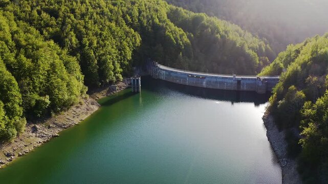 Aerial view of the Irabia dam and its surrounding forests in the Selva de Irati, Navarra, Spain.