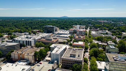 View of Stone Mountain from downtown Decatur Georgia. Aerial drone cityscape of downtown Decatur. 
