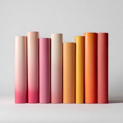Colorful ombre books on white background, studio shot, for education or design