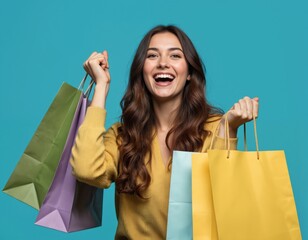 Excited young woman holds colorful shopping bags, showing pure joy, enthusiasm. Vibrant yellow sweater matches cheerful expression. Wears stylish goggles, modern fashion sense.